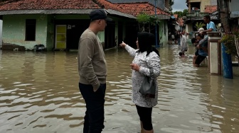 Tinjau Lokasi Banjir, Aksi Muzdalifah Gendong Bayi saat Evakuasi Disorot