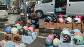 BRI Purwodadi Perkenalkan QRIS kepada Pedagang UMKM di Car Free Day Grobogan