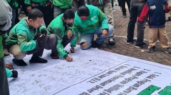 Langgar Aturan Pemerintah, Mitra Grab Yogyakarta Demo Tolak Program Baru Akses Hemat