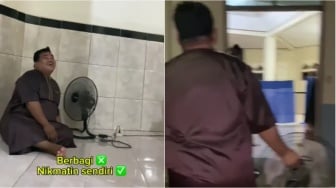 Ramadhan Core: Aksi Kocak Pria Bawa Kipas Angin Saat Salat Tarawih Viral