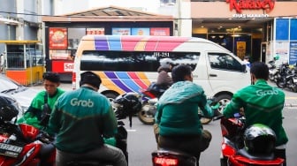 Grab Klaim Kurangi Emisi Karbon 30.000 Ton Lewat Ribuan Armada Motor Listrik