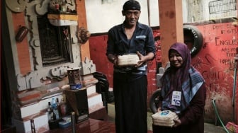 Berbagi Berkah Kurban Antar Umat Beragama dengan Tradisi Ngejotin di Bali