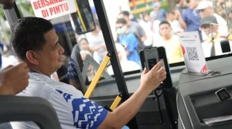 Apa Perbedaan QRIS Tap dan QRIS Berbasis Kode QR?