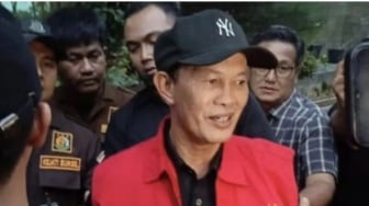 BREAKING: Penampilan Harnojoyo Jadi Sorotan saat Ditahan Kejati Sumsel