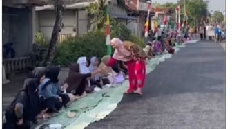 Penantian Enam Tahun Berakhir, Warga Desa Mernek Gelar Syukuran di Atas Jalan Mulus