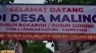 Cerita Sedih di Balik Viral Spanduk Desa Maling di Pamekasan: Motor hingga Emas hilang Tak Berhenti