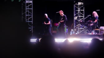 Grup Musik MEW saat tampil di Konser LaLaLa Festival 2025 di Jiexpo Kemayoran, Jakarta, Sabtu (23/8/2025). [Suara.com/Alfian Winanto]