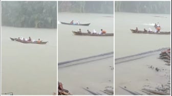 Viral! Bocah SD Tarik Perahu Teman dari Arus Deras Demi Bisa Sekolah