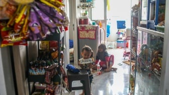 Suasana aktivitas warga di Kampung Susun Bayam, Jakarta, Selasa (26/8/2025). [Suara.com/Alfian Winanto]