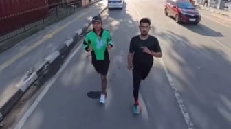 Aksi Solidaritas untuk Affan dari Warga Medan: Lari 13 Km Pakai Jaket Ojol