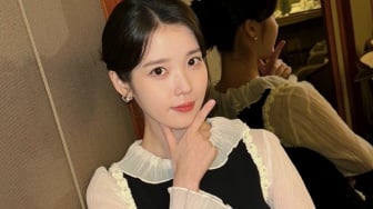 Kejutkan Penggemar, IU Tutup Musim Panas Lewat Single Terbaru 'Bye, Summer'