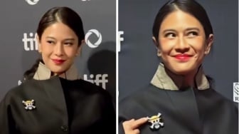 Dian Sastro Hadiri TIFF 2025, Tampil Elegan dengan Pin Bajak Laut One Piece yang Curi Perhatian