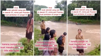 Jeritan dari Tepi Sungai, Anak Sekolah Berseragam Pramuka Minta Jembatan ke Prabowo!