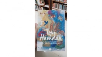 Topi Hamdan: Membaca Kemanusiaan dari Sisi Orang Kecil