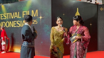 Gaun Maudy Ayunda di FFI 2025 Jadi Sorotan, Intip Detail Kupu-Kupu di Punggungnya