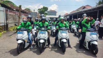 Grab Indonesia 2025: Ketika Platform Digital Menjadi Bantalan Sosial dan Mesin Pertumbuhan Ekonomi