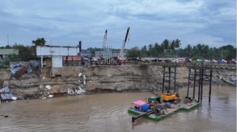 Mengumpulkan Kembali Puing-puing Sisa Kehancuran, Pasca Banjir Aceh