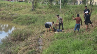 Detik-detik Mencekam Polisi Rebut Kaki Ibu dari Cengkeraman Buaya 3 Meter di Tarakan