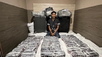 Digerebek di Kamar Hotel Dumai, WNA Malaysia Bawa 99.600 Butir Happy Five Senilai Rp39,8 Miliar!