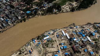 Foto udara permukiman penduduk yang hancur dan rusak di Desa Sukajadi, Aceh Tamiang, Aceh, Jumat (20/2/2026). [ANTARA FOTO/Aprillio Akbar/bar]