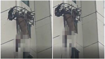 Ngeri! Petugas Pembersih Kaca Terombang-ambing di Ketinggian Apartemen Surabaya