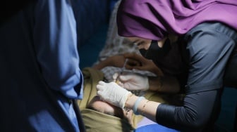 Wow! Dokter Ini Pecahkan Rekor MURI: Suntik Filler Dagu Terbanyak dalam Sehari