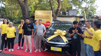 Iseng Buka Aplikasi Setelah Bayar Tagihan, Keluarga di Bali Malah Dapat Mobil BYD M6