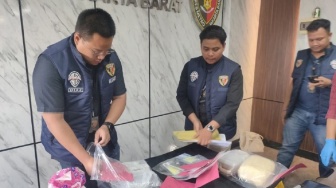 Terbongkar! Rahasia Cairan Black Dollar WNA Liberia yang Kuras Rp1,6 Miliar: Cuma Air Detergen