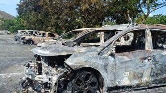 Update Kericuhan Lukas Enembe: 14 Orang Diperiksa, Polisi Data Puluhan Kendaraan yang Rusak