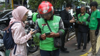 Potongan Aplikasi Ojol 8 Persen Tak Untungkan Mitra Pengemudi