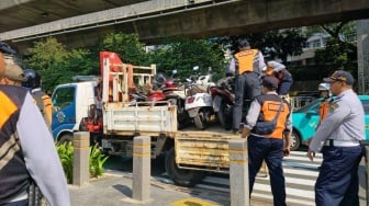 Ulah Jukir Liar Bikin 21 Motor di Trotoar Satrio Kuningan Kena Razia