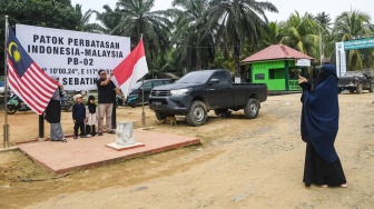 Mengintip Kehidupan Dua Negara dari Wisata Patok Perbatasan Sebatik