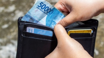 Bukan Sekadar Angka di Layar: Menagih Kedaulatan Rupiah dan Jurus BI Lepas dari Kecanduan Dolar
