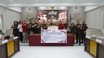 Kejati Lampung Pulihkan Rp1,14 Triliun Uang Negara, Ada Tumpukan Dolar dan Emas