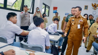 Sekolah Kemitraan dan Mobilitas Sosial: Pendekatan Collaborative Governance