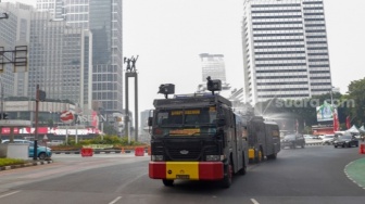 Tepung Singkong untuk Atasi Karhutla, Water Cannon untuk Redam Suara Rakyat