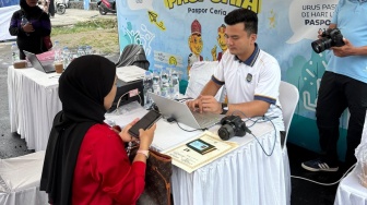 Imigrasi Belawan Hadirkan Pasporia di Car Free Day, Warga Kini Bisa Urus Paspor di Akhir Pekan