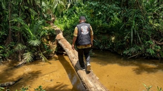 Tak Gentar Jalan Berlumpur, Kepala Unit BRI Jemput Pelaku UMKM di Pelosok Rantau Prapat