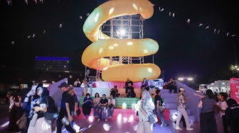 Pengunjung beraktivitas di Festival Musik Pestapora 2026 di JIExpo Kemayoran, Jakarta, Jumat (25/9/2026). [Suara.com/Alfian Winanto]