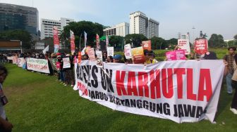 Soroti Penanganan Karhutla yang Dinilai Semrawut, Koalisi Sipil Gelar Aksi di Tugu Tani