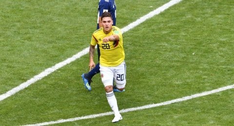 Gelandang Kolombia, Juan Quintero merayakan golnya ke gawang Jepang di laga Grup H Piala Dunia, Selasa (19/6). [AFP/Mladen Antonov]