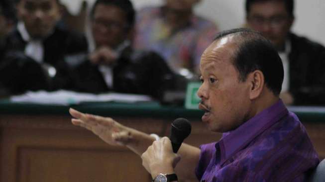 Ekspresi Sutan Bhatoegana sebagai saksi dalam persidangan kasus suap mantan Kepala SKK Migas Rudi Rubiandini di Pengadilan Tipikor Jakarta, Selasa (25/2). [Bowo Raharjo]