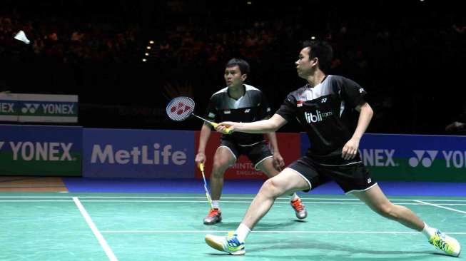 Pasangan Mohamad Ahsan (kanan)/Hendra Setiawan di ajang All England 2014, Minggu (9/3). [Humas PBSI]