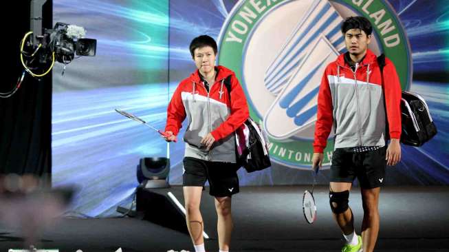 Pasangan Juara All England 2014, Tontowi Ahmad/Liliyana Natsir. di ajang All England 2014, Minggu (9/3). [Humas PBSI]