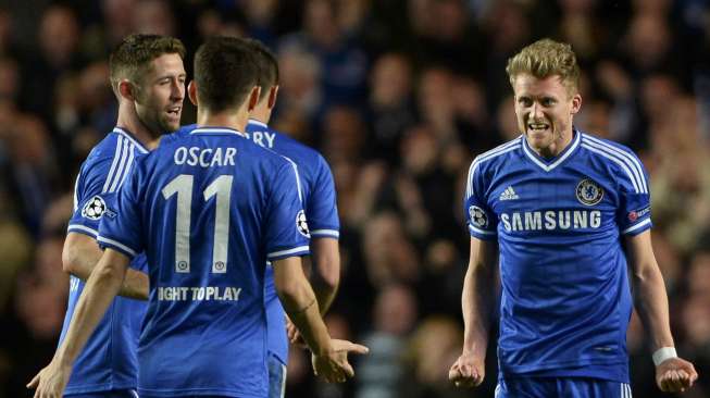 Andre Schuerrle merayakan golnya di babak pertama yang membuat Chelsea unggul 1-0 di menit ke-32.(REUTERS/Dylan Martinez)