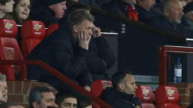 David Moyes di Old Trafford, Manchester, Selasa (25/3). [Reuters/Phil Noble] 