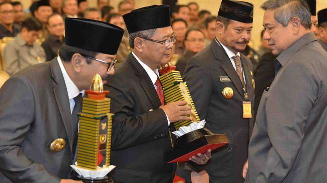 Peringatan Hari Otonomi Daerah ke-18 Tahun 2014 di Istana Negara, Jakarta, Jumat (25/4). [Antara/Widodo S. Jusuf]