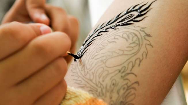 Ilustrasi tato. (Sumber: Shutterstock)