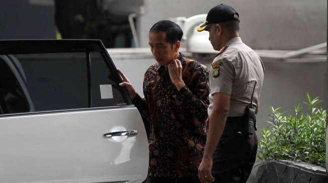 Calon Presiden nomor urut 2 Joko Widodo tiba di gedung KPK, di Jakarta, Kamis (26/6). [suara.com/Adrian Mahakam]