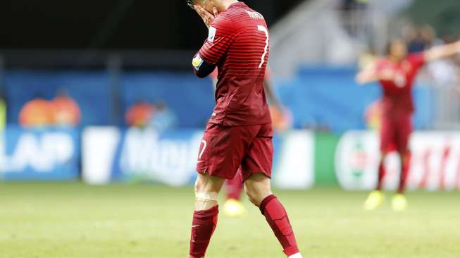 Reaksi Cristiano Ronaldo setelah Portugal dipastikan tersingkir meski menang 1-0 atas Ghana.(REUTERS/Jorge Silva)